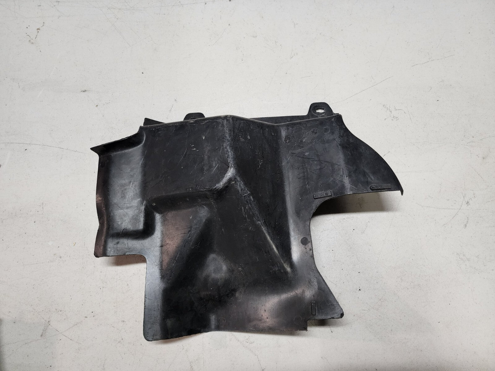 BMW E30 OEM Driver Headlight Splash Guard Covering Trim